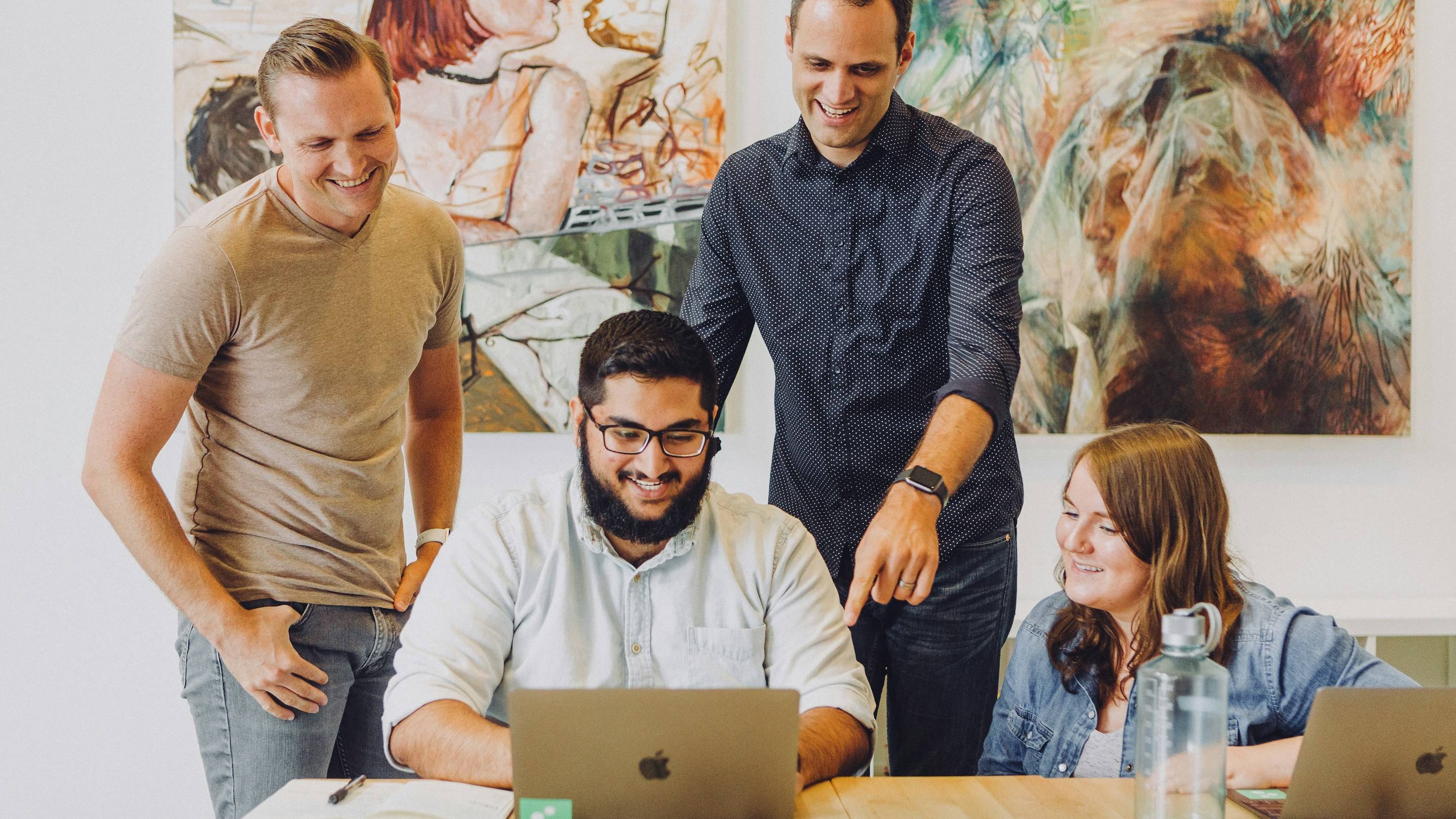 A founder meeting with a development team